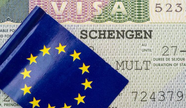 Schengen visa shown with the Schengen flag
