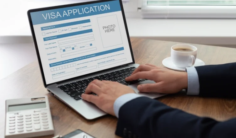 Online visa application form on laptop