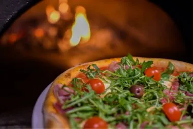 Wood-fired Pizza with Arugula and Tomatoes