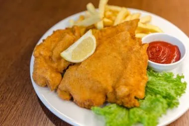 Fried Meat With Potato Fries and Ketchup Dip on Plate